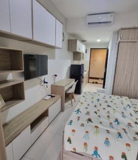 Pinang Apartment | Tentrem Room at Springwood Residence