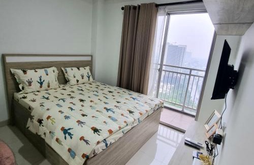 Pinang Apartment | Tentrem Room at Springwood Residence