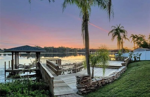 Longwood House | The American Dream House – Lakefront Luxury with 2 Heated Pools & Hot Tub