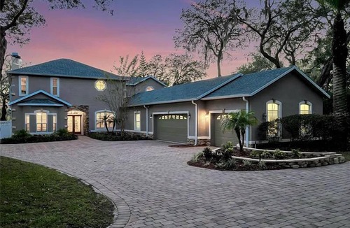 Longwood House | The American Dream House – Lakefront Luxury with 2 Heated Pools & Hot Tub