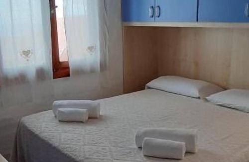 Capo Coda Cavallo Apartment | Three-room apartment
