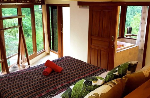 Sukasada Bed & Breakfast | Villa Ayu offers stunning view over mountains green valley with waterfall