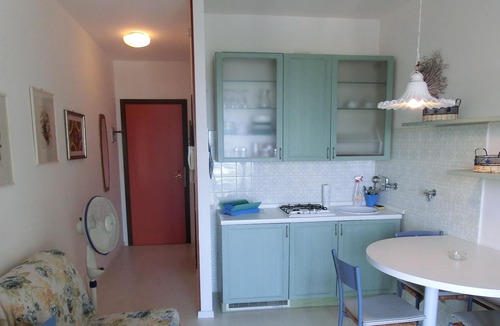 Lignano Sabbiadoro Apartment | Wonderful studio with swimming pool, terrace and sea view by Beahost Rentals