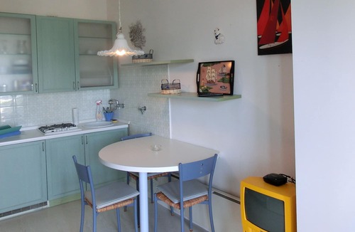 Lignano Sabbiadoro Apartment | Wonderful studio with swimming pool, terrace and sea view by Beahost Rentals