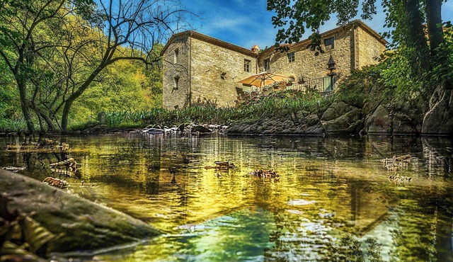 1800s stone house with hot tub and river access