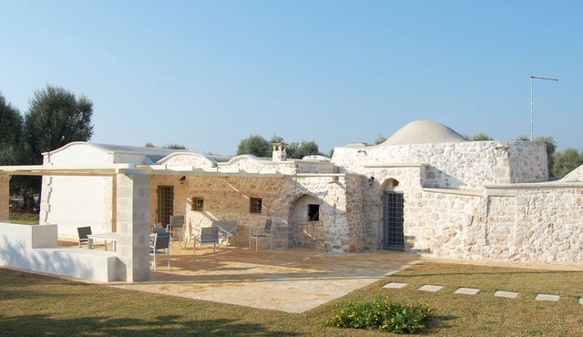 "Al Guappo D'oro," trullo with pool nestled in the Apulian countryside.