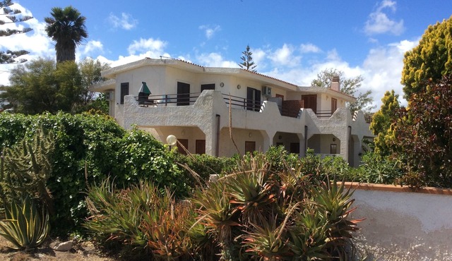 beautiful apartment in villa, private beach with umbrellas and sunbeds