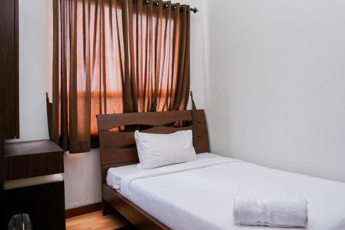 Best Price 2BR at Taman Melati Margonda Apartment By Travelio