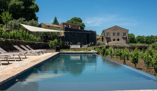Borgo Rovittello, traditional Sicilian house with pool immersed in vineyards.