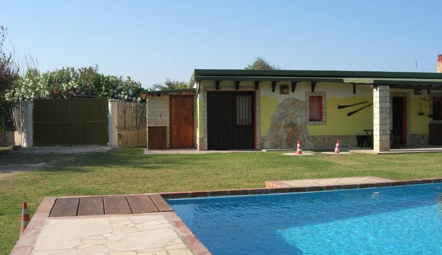 Chalet with private pool with direct beach access