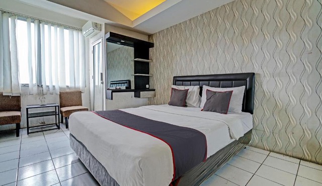 Collection O 92643 Emerald Apartement By Tahha Hospitality