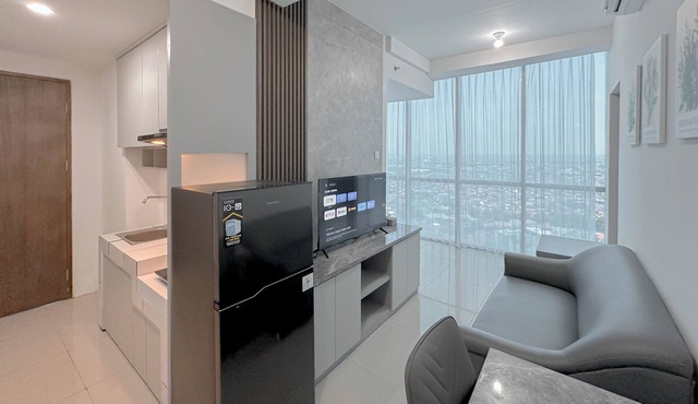 Combined Grey Toned 2Br Apartment At The City Square Surabaya