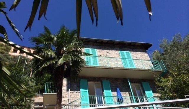 Detached village house with garden and views of lake and mountains. Near lake