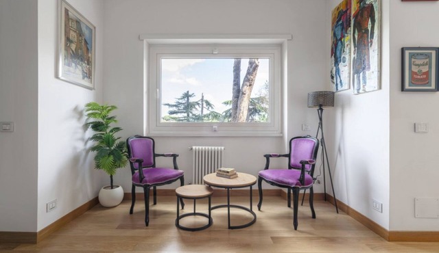 Elegant apartment ideal for families, couples, or travelers seeking comfort and style. Contemporary furnishings blend seamlessly with the tranquility of the surrounding greenery. The apartment comprises a spacious and bright living room, two bedrooms, a