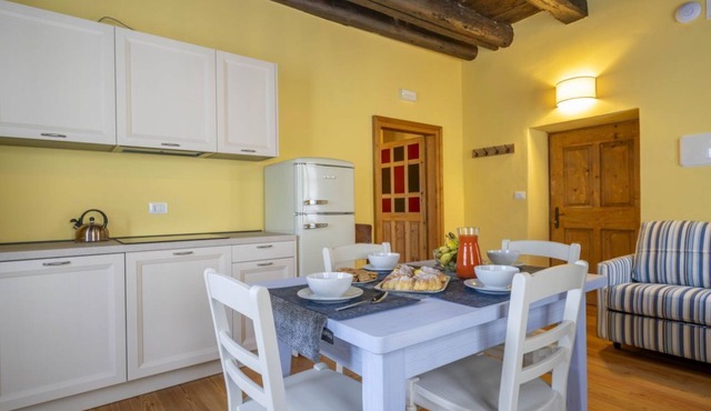 GuestHost - A welcoming apartment of approximately 50 square meters, perfect for five people, located on the first floor of a historic building built in 1864 and renovated in 2025 while maintaining its historic atmosphere (NO elevator).The property is lo