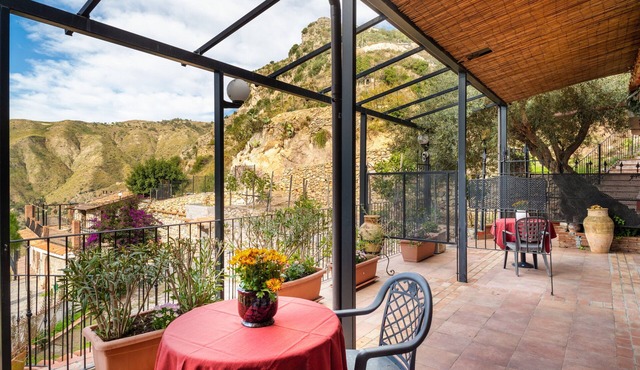Holiday Apartment 'Garden Cottage I Dammusi - Ulivo' with Mountain View, Shared Pool & Wi-Fi