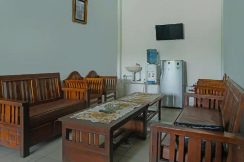 Hotel O Wisma Melyro Syariah Near Yamaha - Thamrin Brothers Cabang Muara Dua