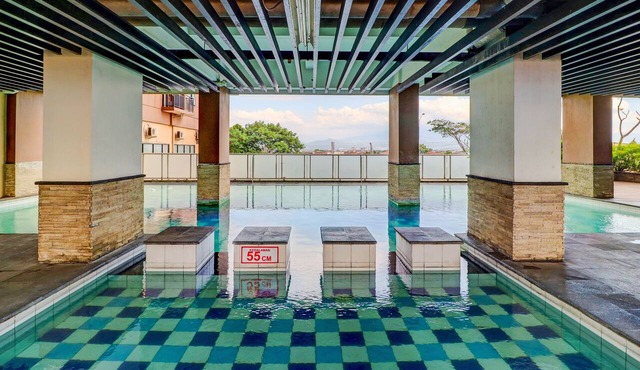 OYO Life 92735 Apartemen Tamansari Panoramic By Santuy
