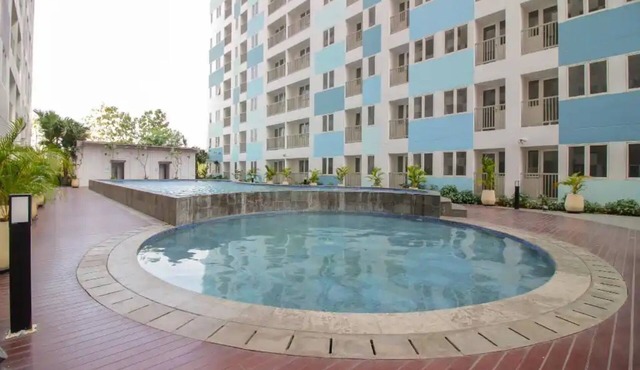 OYO Life 93139 Apartemen Grand Sentraland By Evi