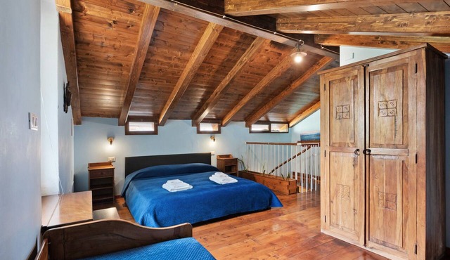 Room 'Matrimoniale Mansardata' with Shared Terrace, Wi-Fi and Air Conditioning