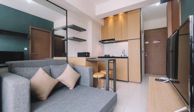 Simple and Cozy Living 2BR at Podomoro Golf View Apartment