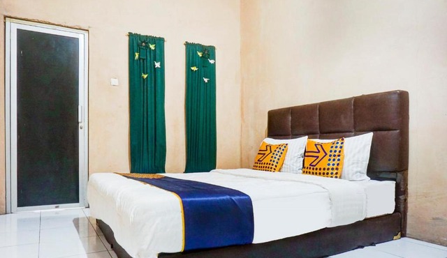 SPOT ON 90146 Sugianto Guesthouse Syariah