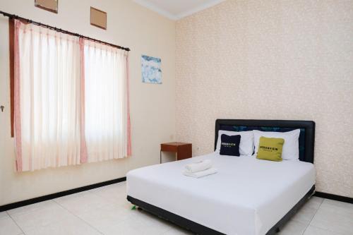 Urbanview Hotel Griya Surya Malang by RedDoorz