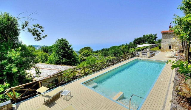 Villa Cibele: An elegant and welcoming three-story villa in a quiet position, located on a hillside above the sea, with Free WI-FI.
