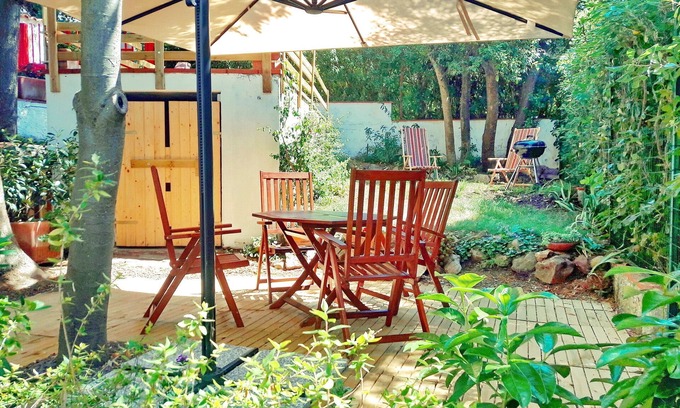 Quercianella Apartment | Fantastic view, private garden, air conditioning, WIFI