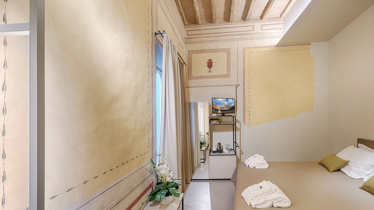 Photo of Bedroom in Siena Historical Center