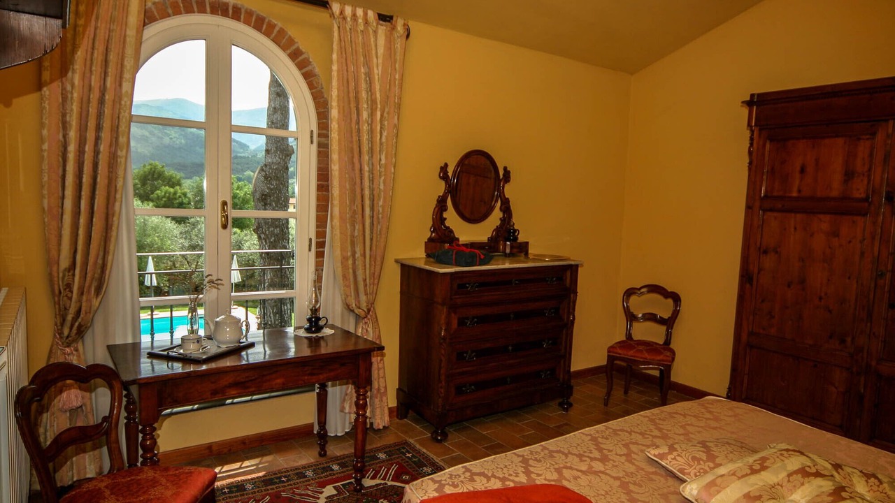 Photo of Bedroom in SantʼAndrea di Compito