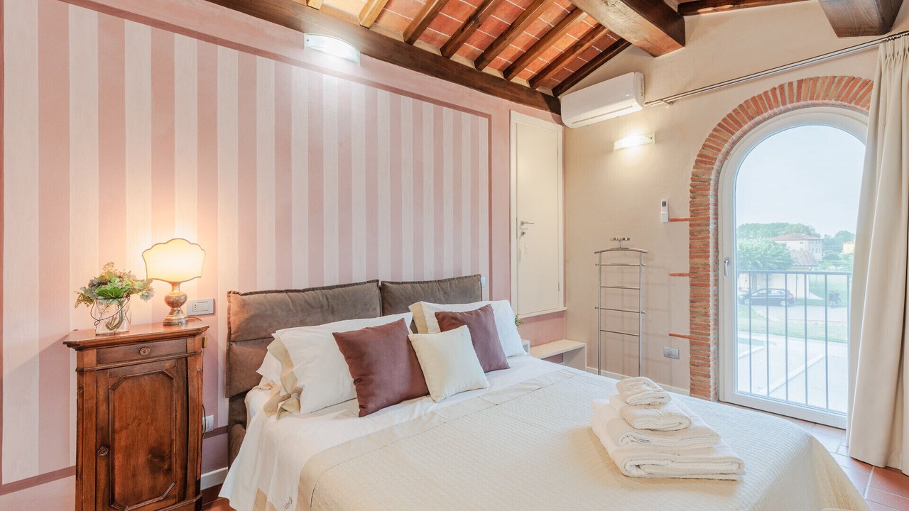 Photo of Bedroom in SantʼAndrea di Compito