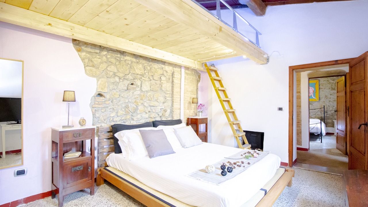 Photo of Bedroom in Castellina Marittima