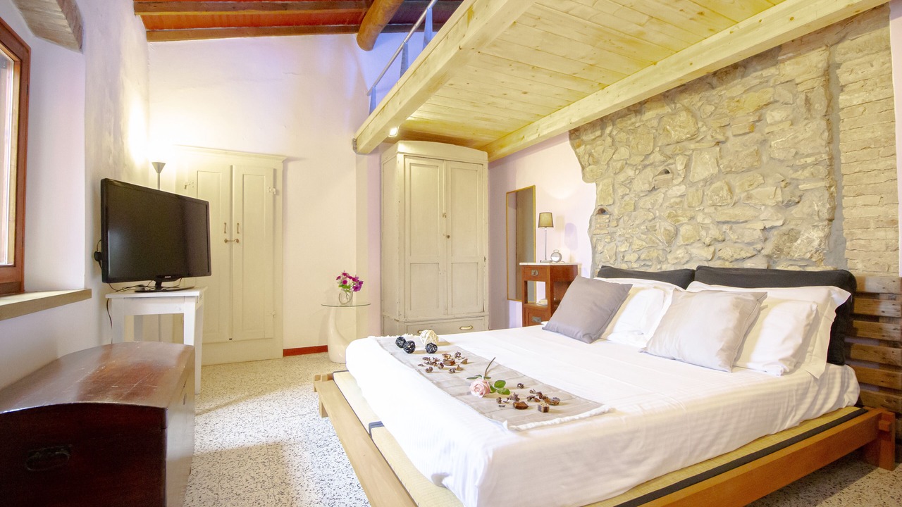 Photo of Bedroom in Castellina Marittima