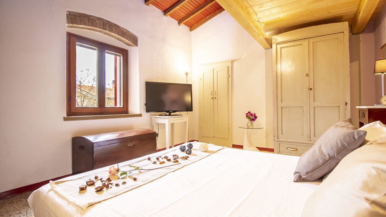 Photo of Bedroom in Castellina Marittima