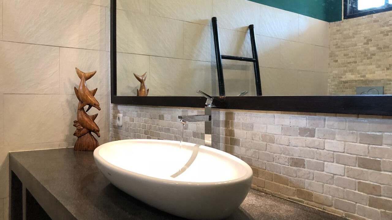 Photo of Bathroom in Dencarik