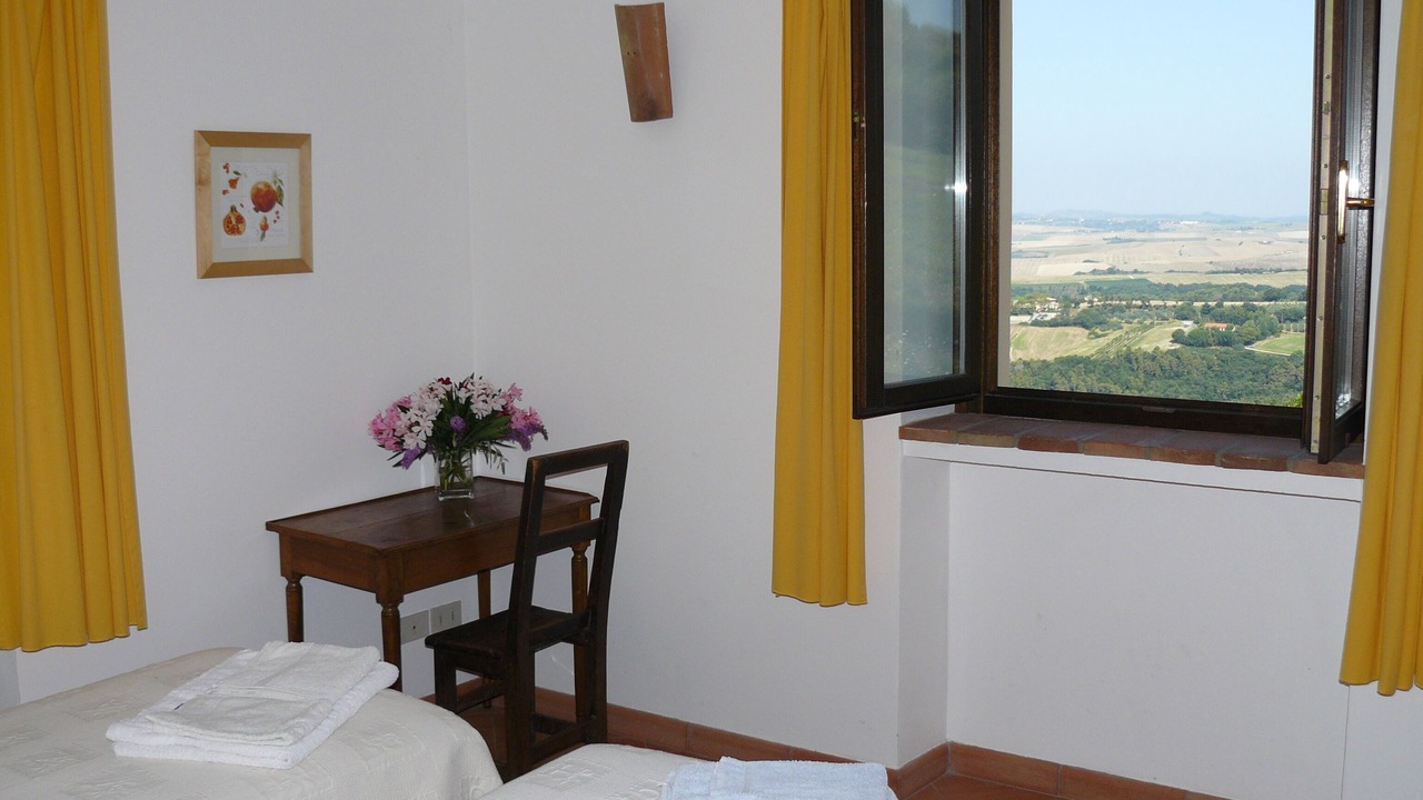 Photo of Bedroom in Castellina Marittima