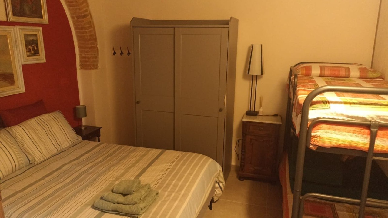 Photo of Bedroom in Castellina Marittima