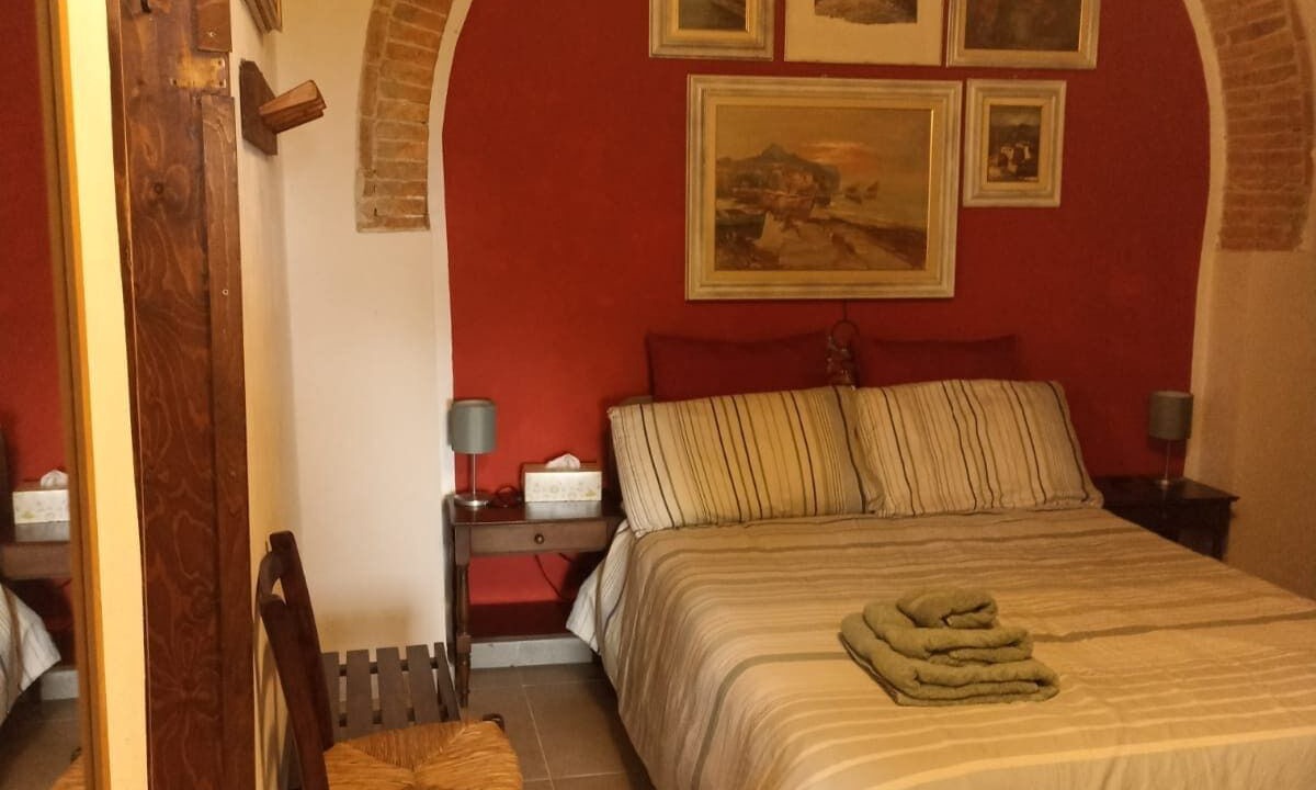 Photo of Bedroom in Castellina Marittima