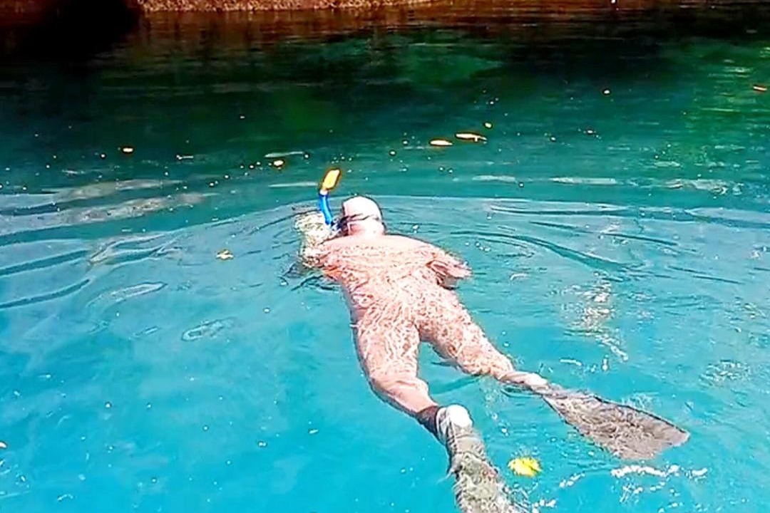 Photo of Human In Picture in Raja Ampat