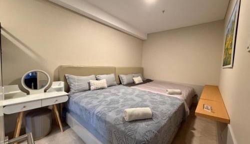 Two-Bedroom Deluxe Apartment with Garden View