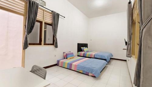 Quadruple Room with Shared Bathroom