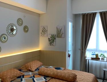 One-Bedroom Apartment with Balcony and Sea View