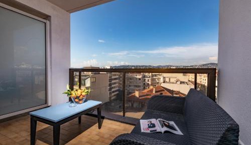 Studio Apartment with Balcony and Partial Sea View